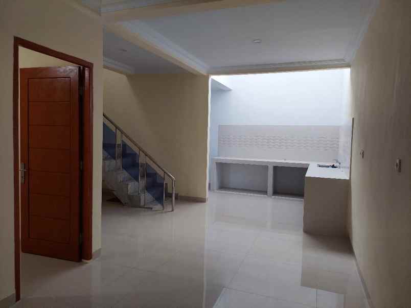 dijual rumah taman harapan baru