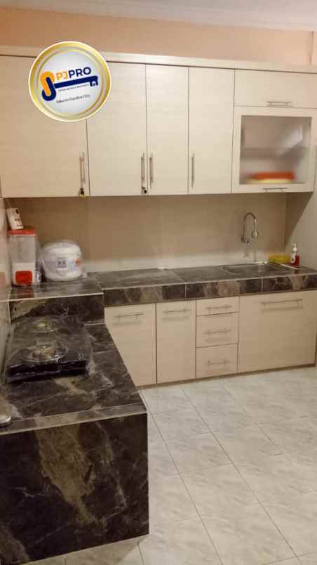 dijual rumah taman modern