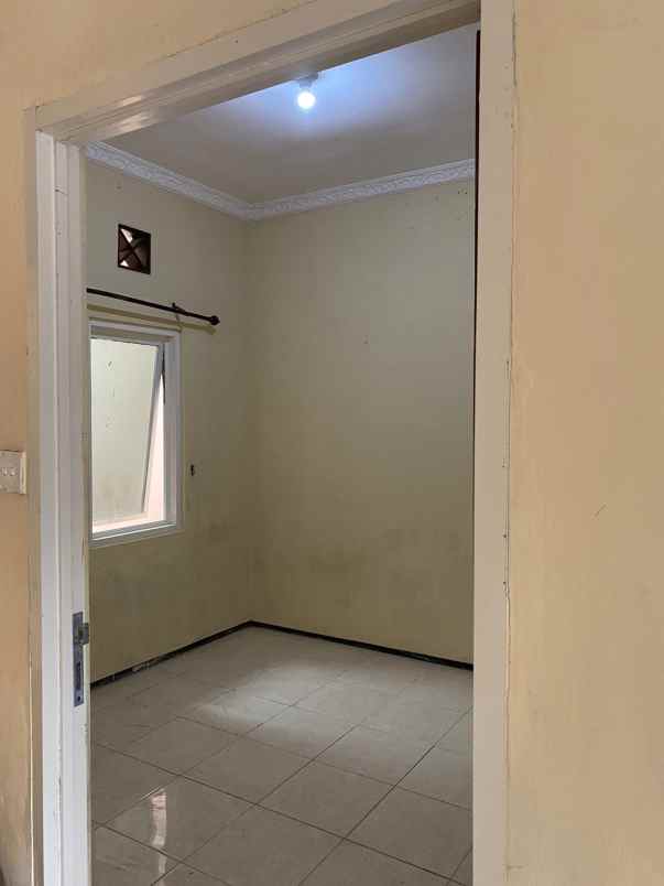 dijual rumah wiguna