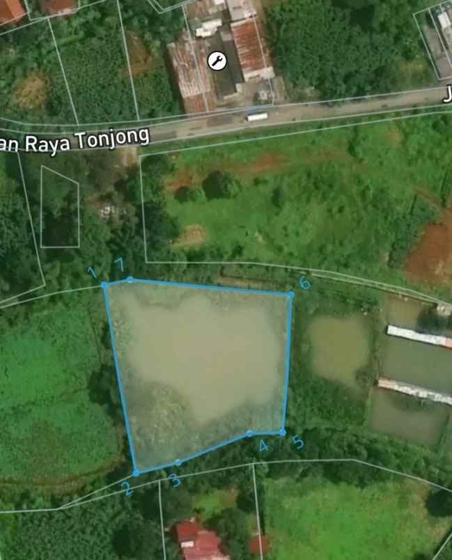 dijual tanah kolam sisi jalan utama