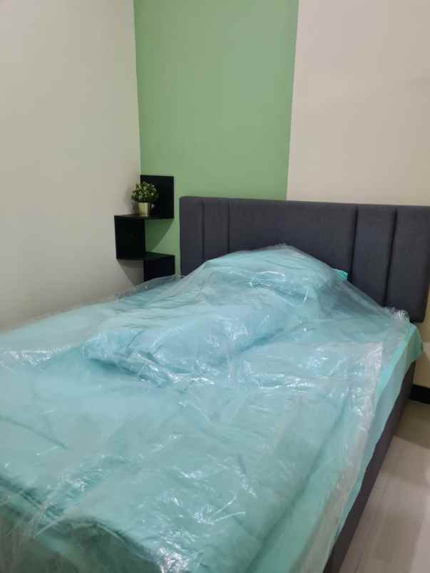 disewakan apartemen amor 2br lt 21 surabaya