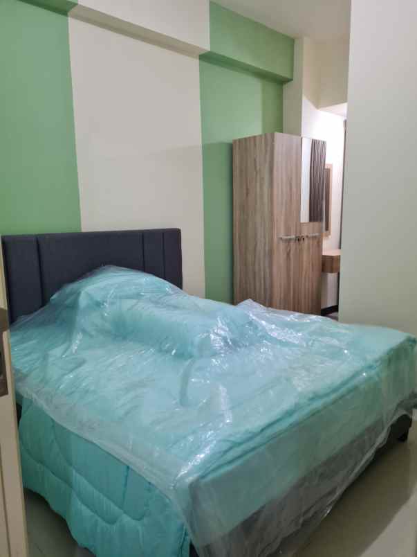 disewakan apartemen amor 2br lt 21 surabaya