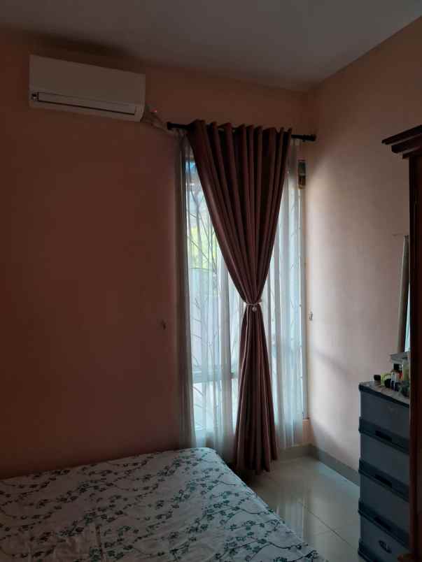 rumah cluster jatimurni pondok melati bekasi