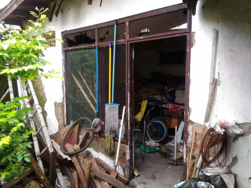 rumah hitung tanah di tengah kota sayap moh ramdhan