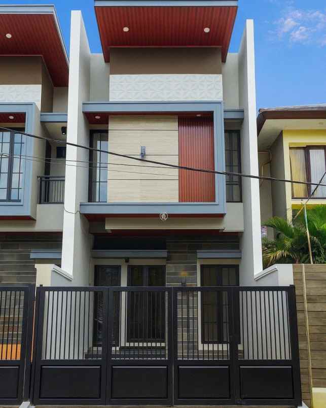 rumah manyar jaya new minimalis row jalan 4 mobil