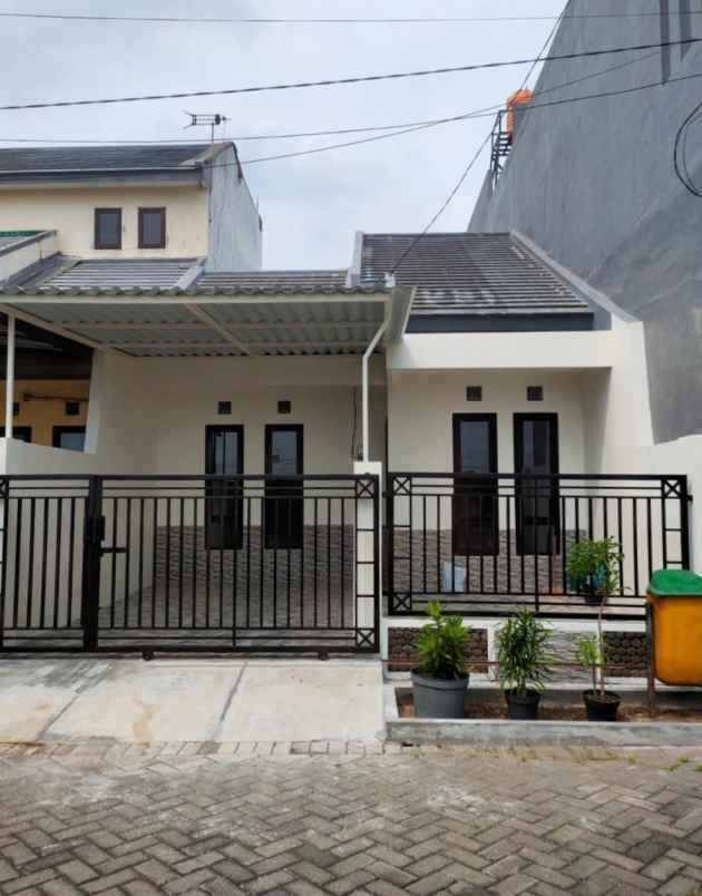 rumah minimalis modern di garden dian regency