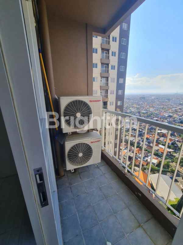 dijual apartemen puncak dharmahusada