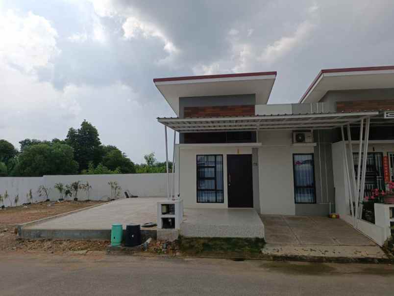 dijual rumah central raya tiban