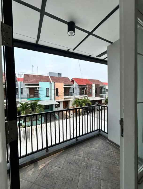 dijual rumah cluster harmoni harapan
