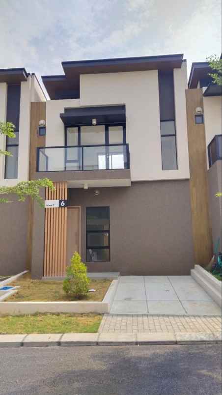 dijual rumah cluster naws delta mas