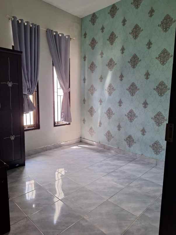 dijual rumah jl puspa sari