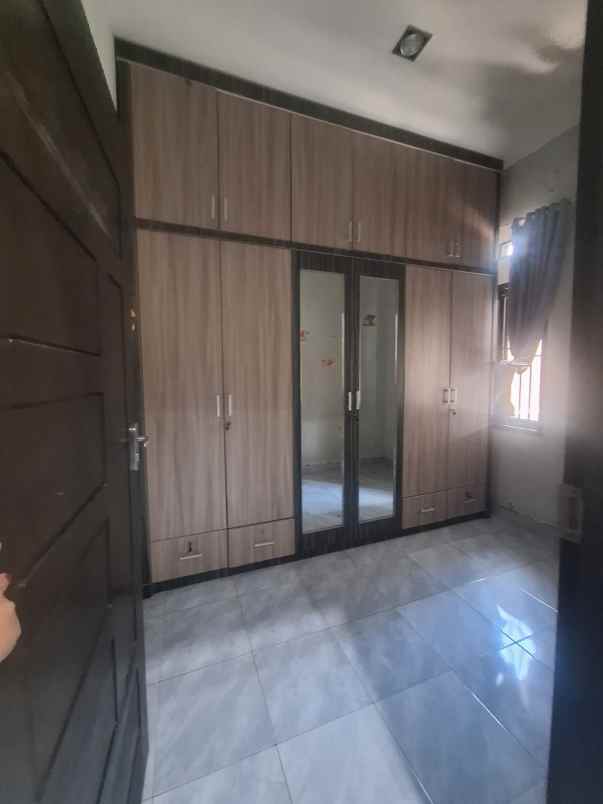 dijual rumah jl puspa sari