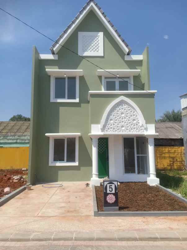 dijual rumah jl raya mustika jaya kota