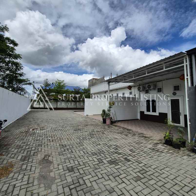dijual rumah jl surya haji komplek