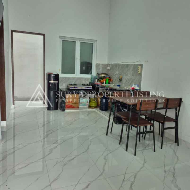 dijual rumah jl surya haji komplek