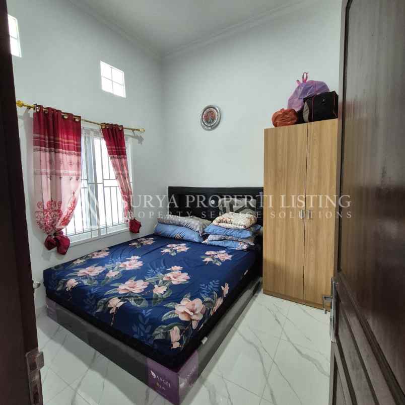 dijual rumah jl surya haji komplek