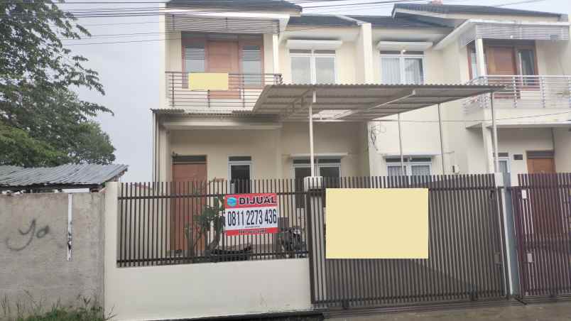 dijual rumah komplek sariwangi