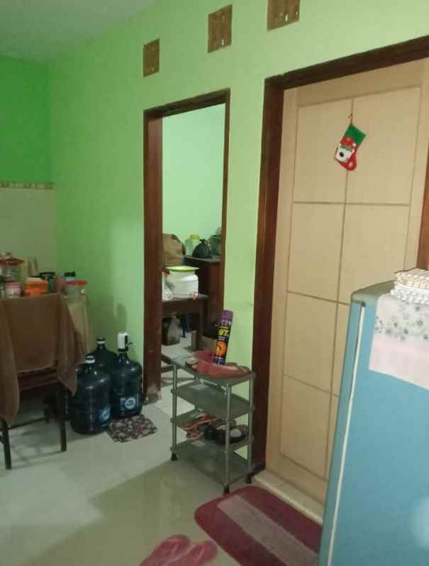 dijual rumah puri surya jaya taman paris