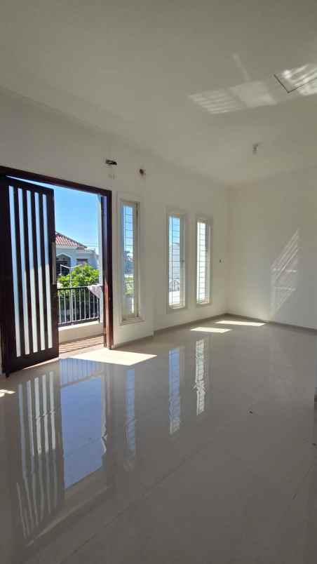 dijual rumah wiguna