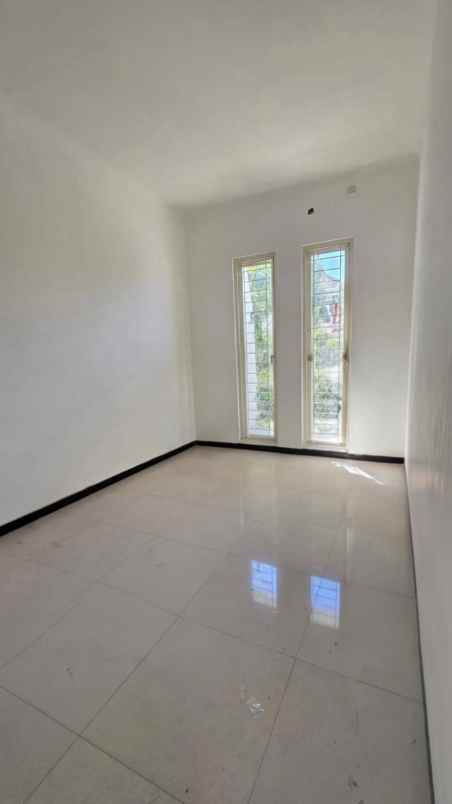 dijual rumah wiguna