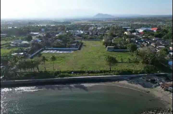 dijual tanah jl poros pantai bira