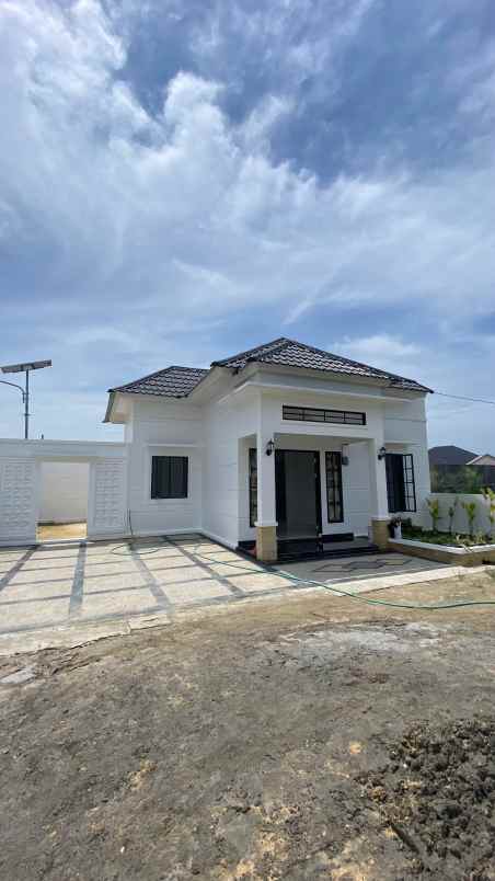 rumah asri minimalis di jalan rawa bening pekanbaru