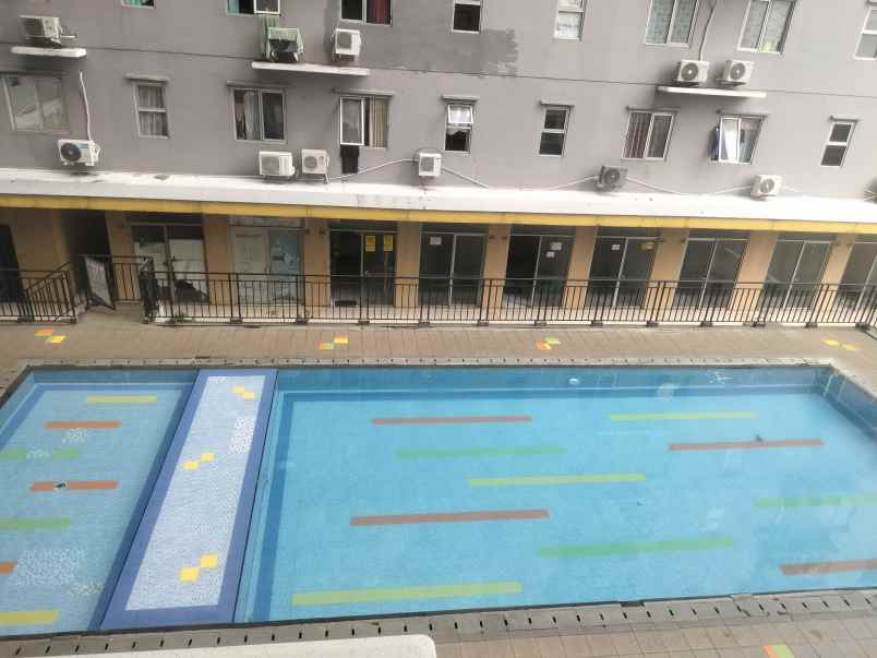 dijual apartment east park 2br view swimming pool