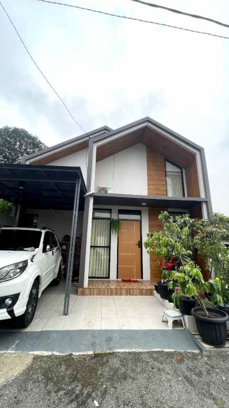 dijual rumah jalan asem jaya mustika