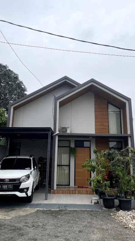 dijual rumah jalan asem jaya mustika