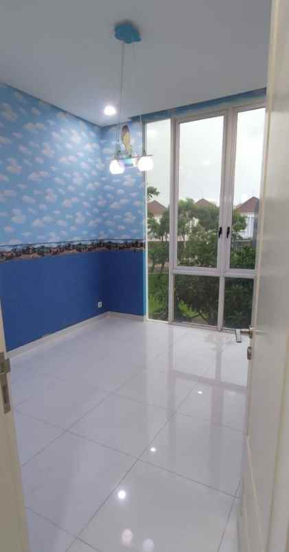 dijual rumah pakuwon city grand island