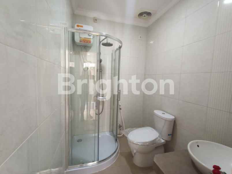 dijual rumah pakuwon city taman mutiara