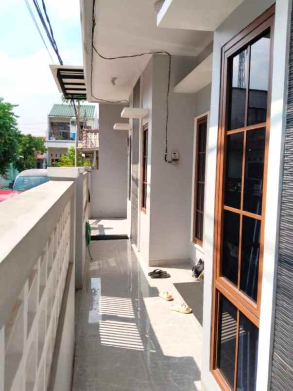 dijual rumah perumahan taman harapan