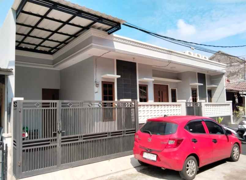 dijual rumah perumahan taman harapan