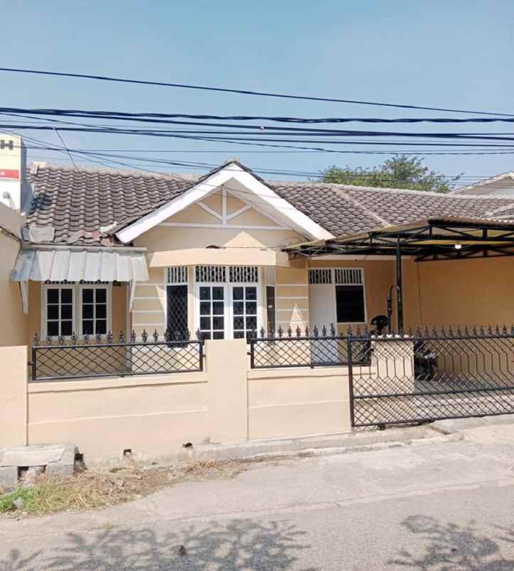 dijual rumah perumahan taman tridaya