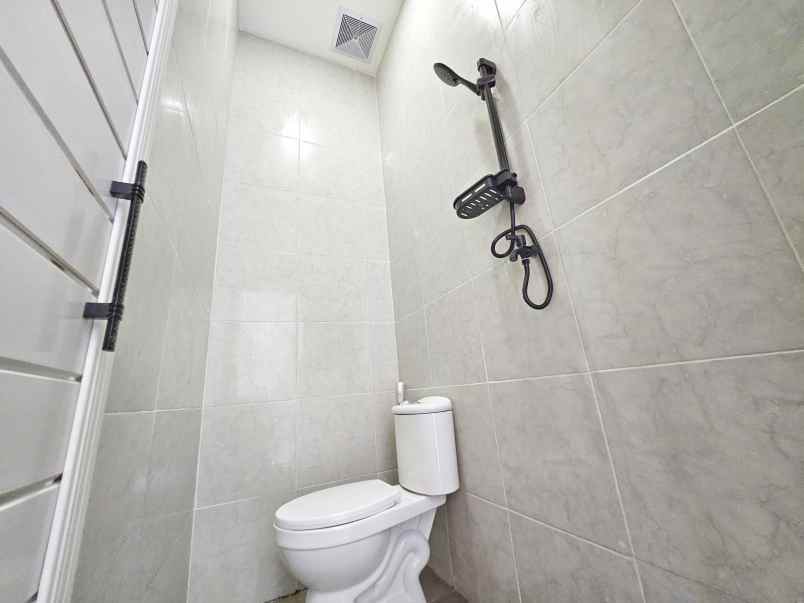 dijual rumah taman harapan baru