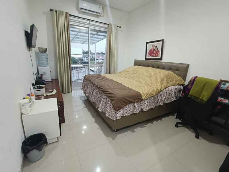 rumah murah bonus kolam renang di bekasi timur regency