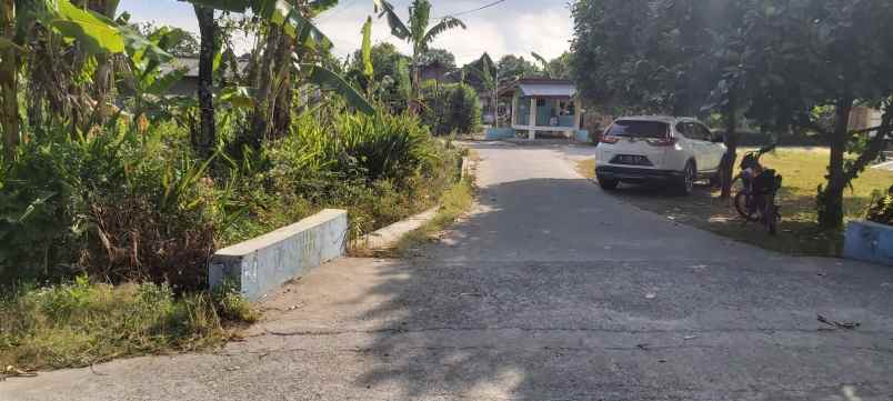 tanah hook mangku aspal area pemukiman penduduk