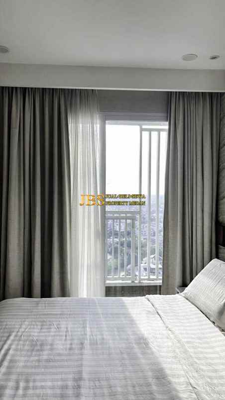 dijual apartemen the reiz condo