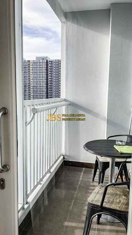 dijual apartemen the reiz condo