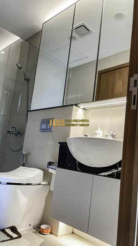 dijual apartemen the reiz condo