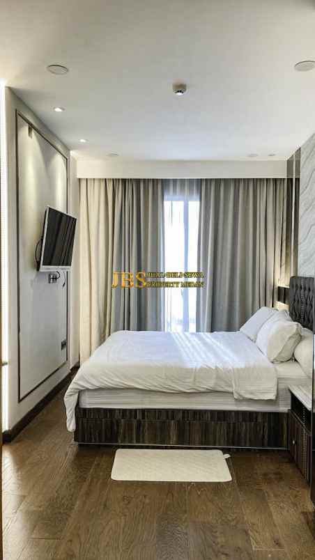 dijual apartemen the reiz condo