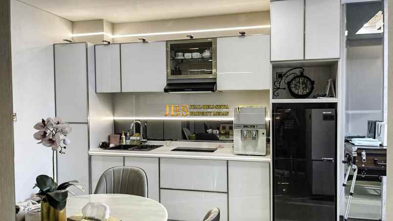 dijual apartemen the reiz condo