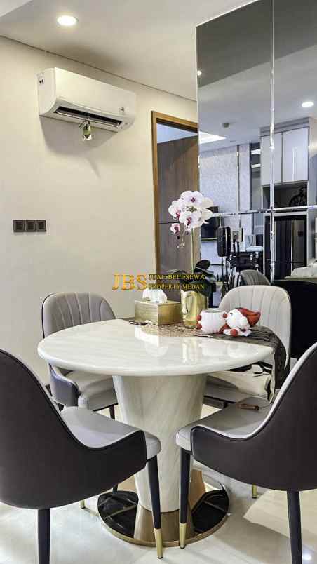 dijual apartemen the reiz condo