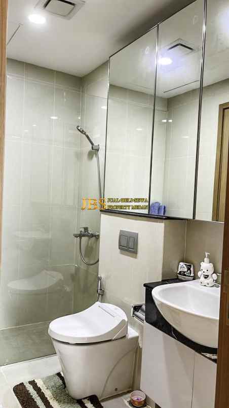 dijual apartemen the reiz condo