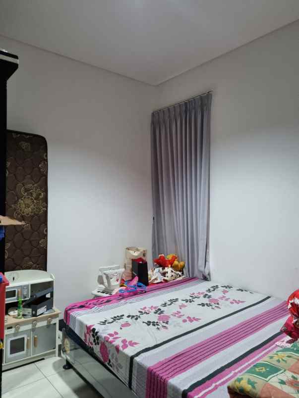 dijual rumah cluster wisteria metland