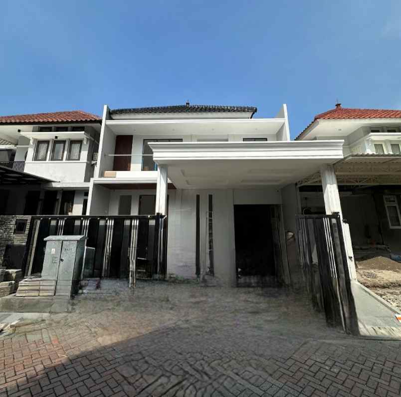 dijual rumah jalan graha famili