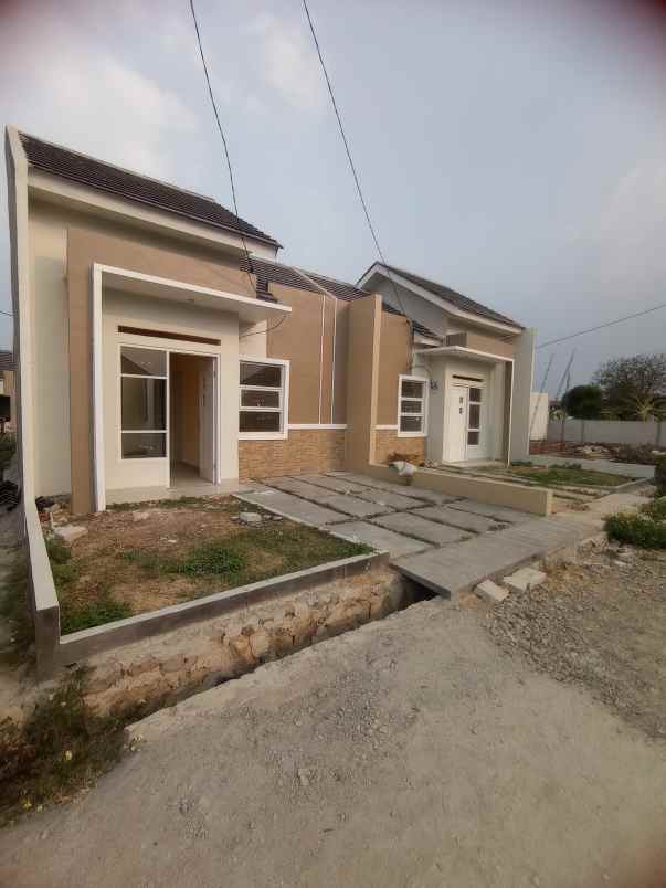 dijual rumah jalan tanah merah sepatan