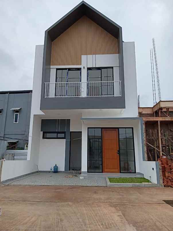 dijual rumah jl raya caman jatibening