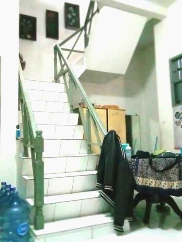 dijual rumah kayu putih