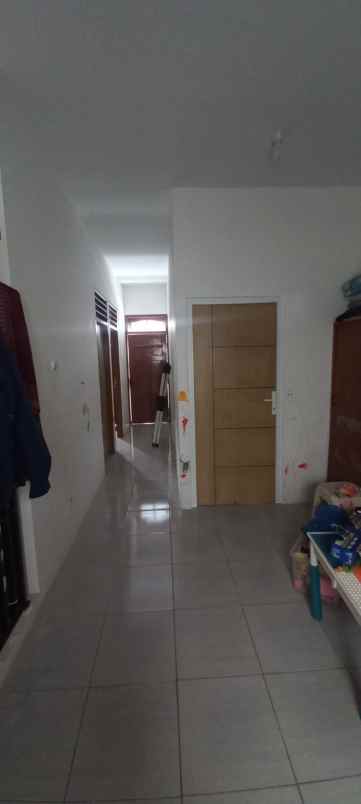 dijual rumah kayu putih